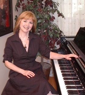 Debbie At Piano in studio